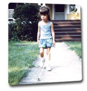 Kindergartener walking independently with cane